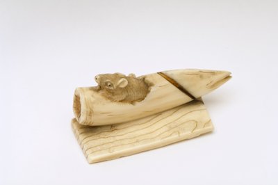 Netsuke of a mouse emerging from a bamboo shoot by Japanese School