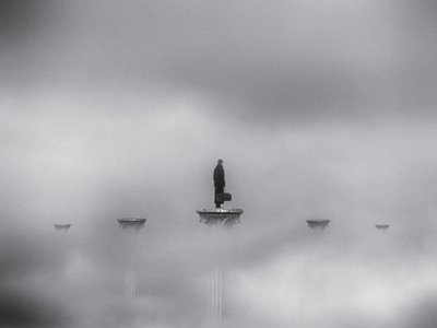 Lone Traveler in Mist by Jeffrey Hummel