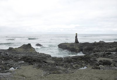 Solitary Woman Coastal View by Jeffrey Hummel