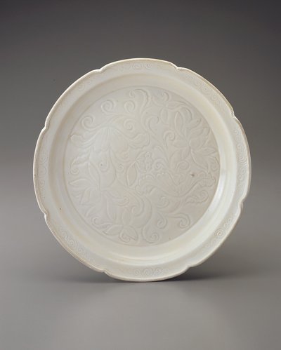 Dish with foliate rim and carved decoration by Jin Dynasty Chinese School