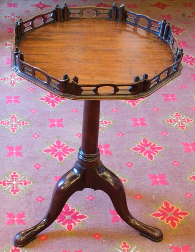 A George III tripod table by John Hodson