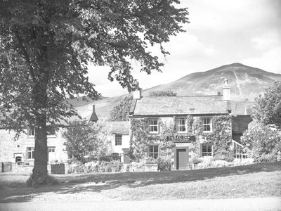 The Stag Inn is the building in the centre of the image with houses either side by Joseph Hardman