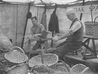 Two Basket Makers at a Show by Joseph Hardman