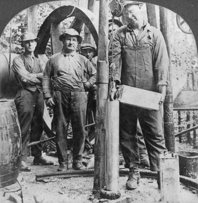 Filling a Shell with Nitro-Glycerine, Oil Field in Pennsylvania, USA, Early 20th Century by Keystone View Company