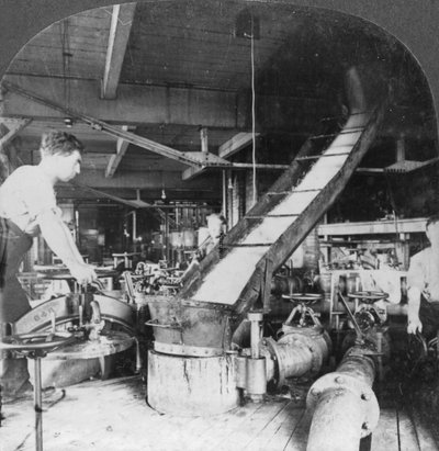 Sugar beet pulp and juice flowing from tank to tank, Montreal, Canada, early 20th century by Keystone View Company