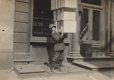 Wagon Boy or "Tail Boy" Helping to Load the Wagon by Lewis Hine