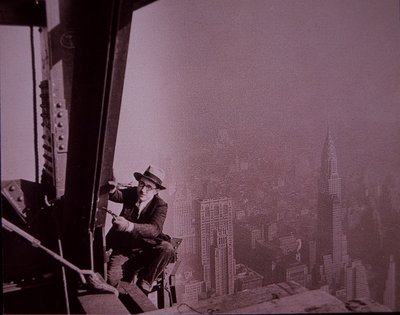 Empire State Building under construction, showing an inspector checking work by Lewis Wickes Hine