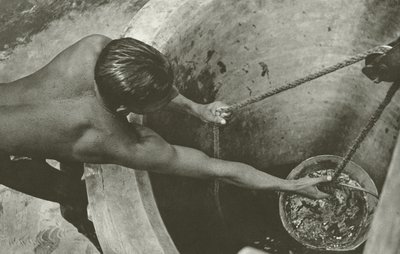 At the well by Lionel Wendt