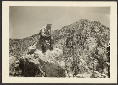 Man Atop Rocks by Louis Fleckenstein