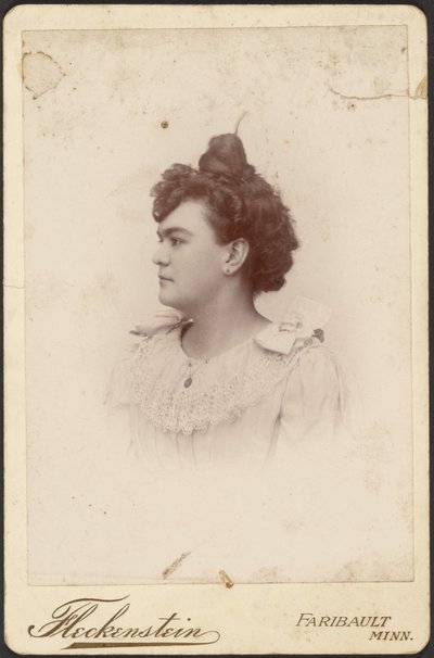 Portrait of a Woman with High Bun by Louis Fleckenstein
