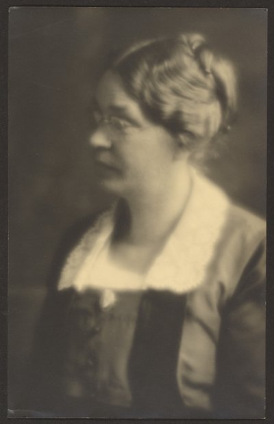 Portrait of a Woman with Open Book (cropped) by Louis Fleckenstein