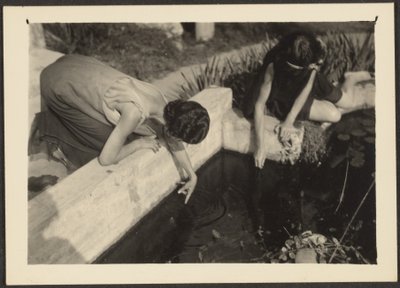 Woman by Garden Pond by Louis Fleckenstein