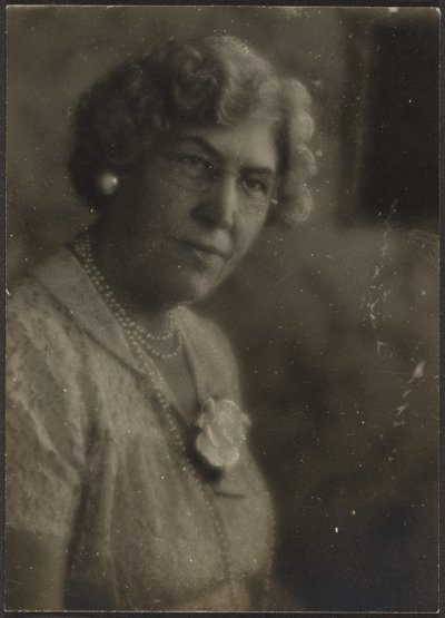 Woman with White Flower and Pearls by Louis Fleckenstein
