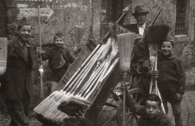 Brooms on Street Vendors by Luigi Leoni