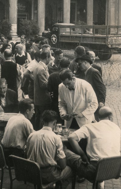 Waiting Tables, in the Background a U.S. Army Truck by Luigi Leoni