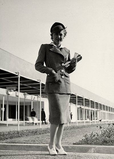 Model in a suit created by the couture house Graldi by Luis Bogino