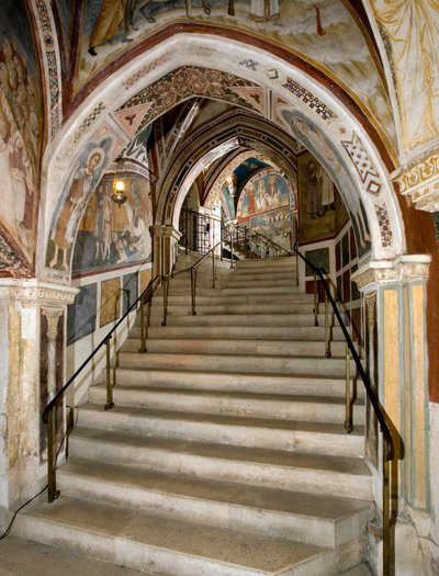 View of the Holy Staircase built on the order of Abbe John V and decorated with frescoes by the master of the Sacro Speco and his entourage. Monastery of Saint Benedetto, Subiaco, Italy by Master Trecentesco of Sacro Speco School