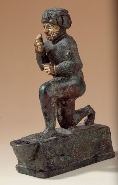 Mesopotamia: Statuette in silver, bronze and gold of kneeling worshiper, ex-voto dedicated to the god Amurru for the life of Hammurabi. 1800 BC. From the Larsa site by Mesopotamian Mesopotamian