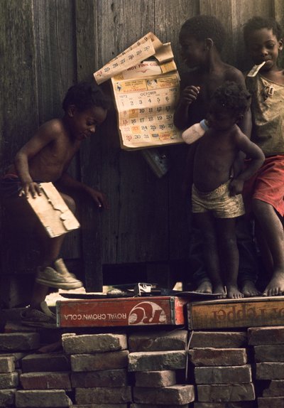 Children of destitute family in Beulah, Mississippi, a Mississippi Delta town that grew as a result of the railroad by Nathan Benn