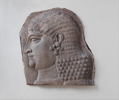 Head of a beardless royal attendant, possibly a eunuch by Neo Assyrian Neo Assyrian