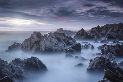 Misty Ocean Rocks by Nuno Araujo