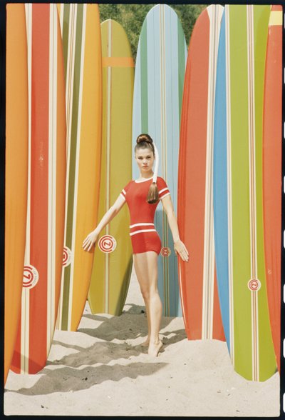 Actress Wende Wagner with surfboards on the beach in Malibu by Orlando Suero
