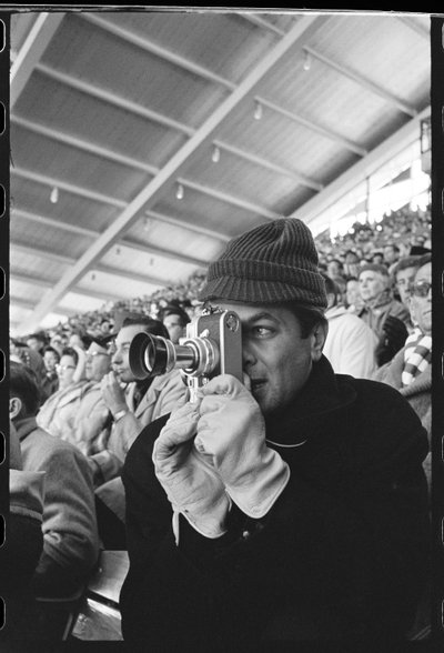 Tony Curtis with Leica camera at the Winter Olympics, Squaw Valley, California by Orlando Suero
