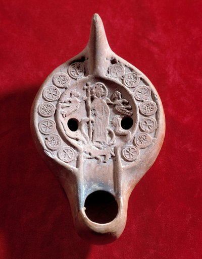 Paleochristian art: oil lamp medallion with a triumphant Christ by Paleo Christian