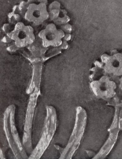 Detail of a threepenny coin by Paul Henning