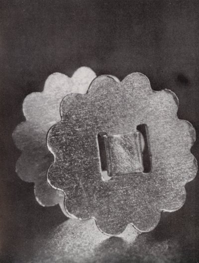 Two Paper Fasteners by Paul Henning