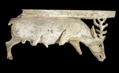 Civilization of the Phoenicians: ornament of a royal ivory bed in the shape of a deer, from the site of Arslan Tash (Syria). 9th century BC. Paris, Musee du Louvre by Phoenician
