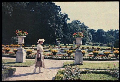 Woman Walking in the Garden of the Bagatelle, Paris, c.1920 by Photographer French