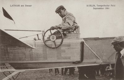 French Aviator Hubert Latham at the Controls of His Aeroplane, Tempelhof Airfield, Berlin, September 1909 by Photographer German