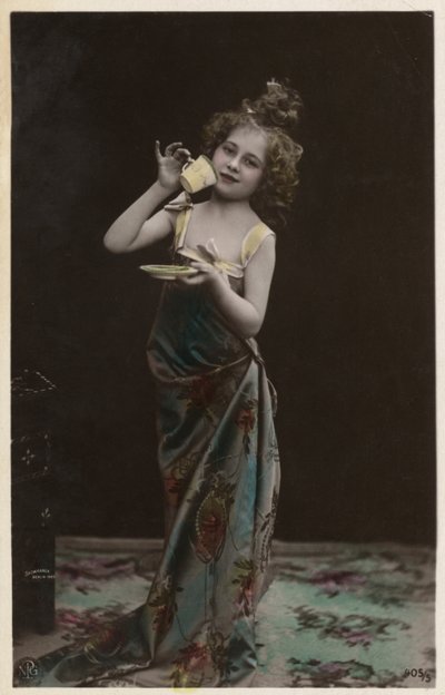 Little girl dressed up drinking tea by Photographer German