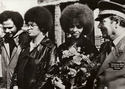 Angela Davis welcomed by soldiers of the National People