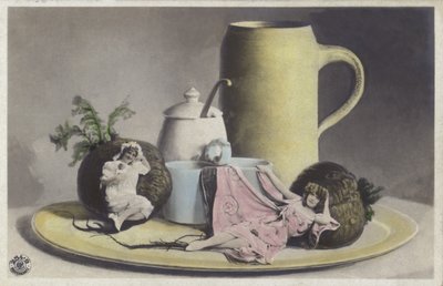 Tiny girls on a tray of crockery by Photographer German