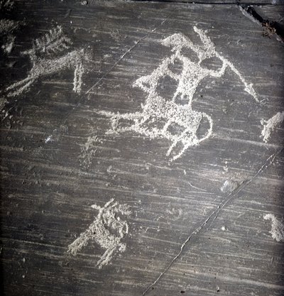 Camunni civilization, Prehistory, rock art: grave rock, representing hunters and deer. Rocher de Naquane, in Valcamonica (Val Camonica) by Prehistoric Prehistoric