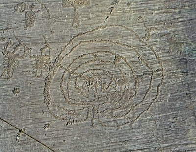 Prehistory, Camunni civilization, rock art: a grave rock of the representation of warriors weapons of shields and swords, and a maze. Period between the Neolithic and the Bronze Age. Capo di Ponte, Parco nazionale delle incisioni rupestri di Naquane, Valca by Prehistoric Prehistoric