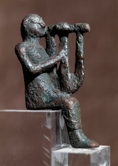 Musician playing the cithar (bronze statuette, 4th-2nd century BC) by Punic