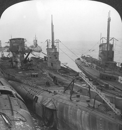 German Submarines Secured in a Channel Port, c1918-c1919 by Realistic Travels Publishers