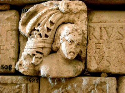 Head, fragment of a sarcophagus, c.1st century by Roman