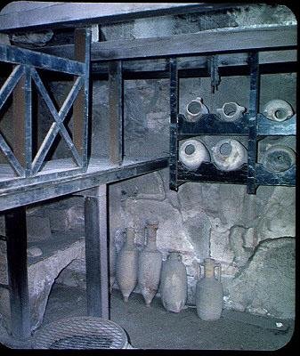 Interior of a shop with amphorae, from the House of Neptune and Amphitrite by Roman