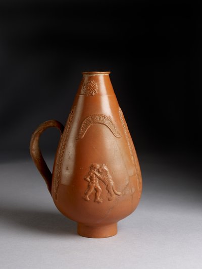 Piriform jug with applied decoration of leopard or cheetah attacking a convict, drunken Pan raping a maenad by Roman