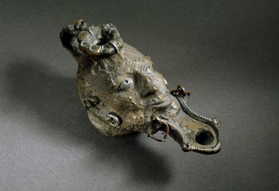 Roman Art: Bronze Oil Lamp in the Shape of a Face by Roman