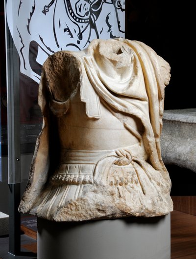 Sculpted torso of a cavalryman thought to be a copy of an original bronze statue of Alexander the Great, c.75-25 BC by Roman