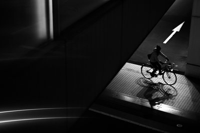 Urban Cyclist Silhouette by Satoshi Hata