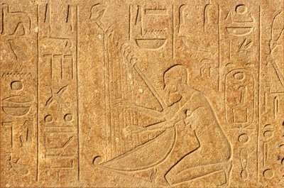 Ancient Egypt, Wall Painting/Carving, Harpist with Head of Hatshepsut at Top of Harp, Karnak Temple, Luxor by School Egyptian