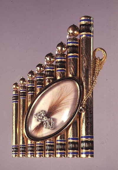 Gold pendant with enamel decoration and set with a locket containing a lock of hair in a diamond set bow (obverse), Russian, early 19th century by School Russian