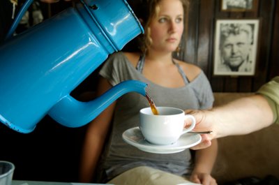 Coffee being served in antique Danish coffee pot, Aarhus, Denmark by Sisse Brimberg