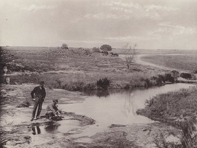 Panning Ore to Discover Gold (b/w photo) by South African Photographer
